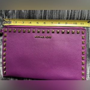 Micheal Kors large studded wristlet